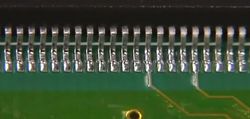 smd soldering،پایه های آی سی که لحیم کاری تمیزی شده اند